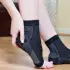 woman wearing a pair of comprex ankle sleeves
